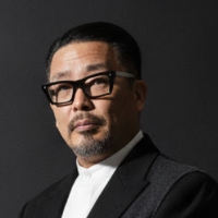 猪川 トム 氏